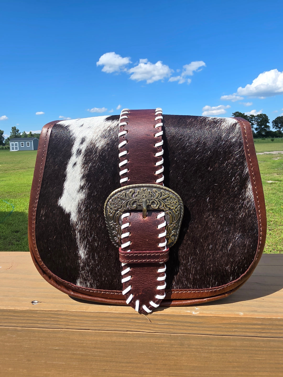 The Saddled Buckle Crossbody – Tooled Leather and Cowhide